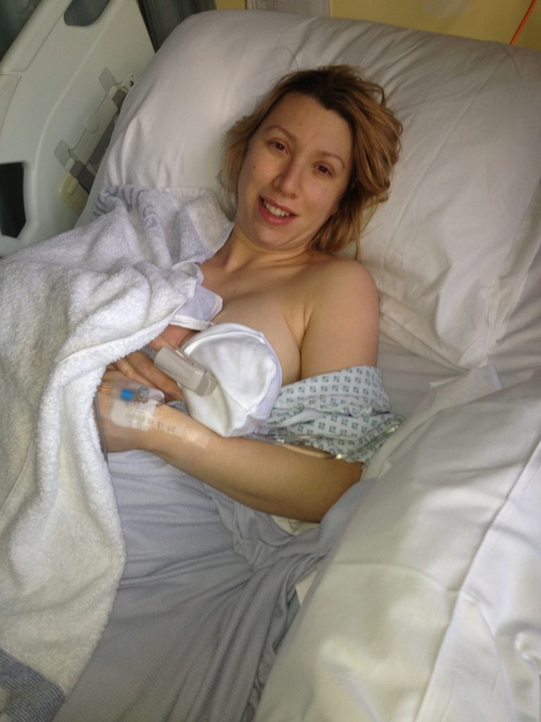 mum breastfeeding baby after a c-section