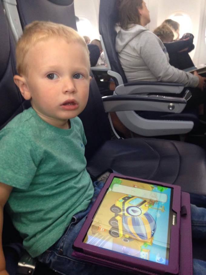 Jake on the plane not looking very happy