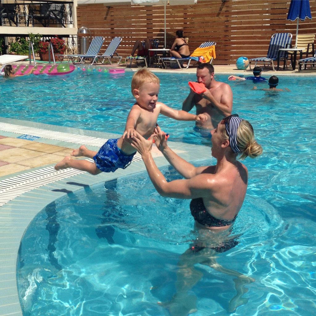 Jake jumping into a pool