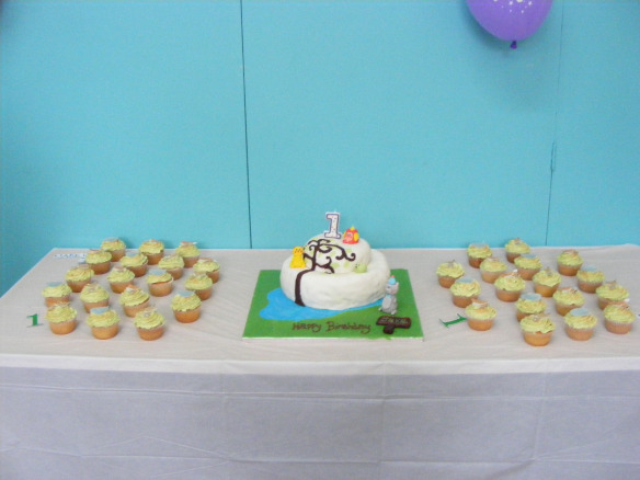 Jake's first birthday cake and cupcakes