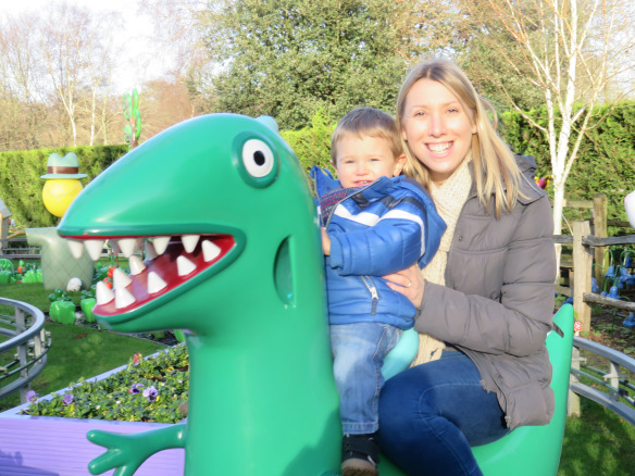 me and Jake on the dinosaur ride at Peppa pig world