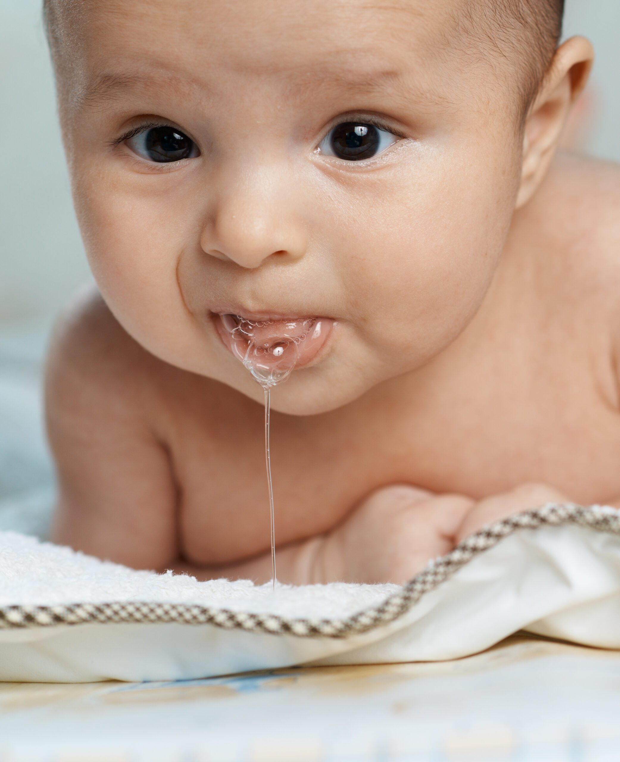 one teething symptom is a dribbling baby