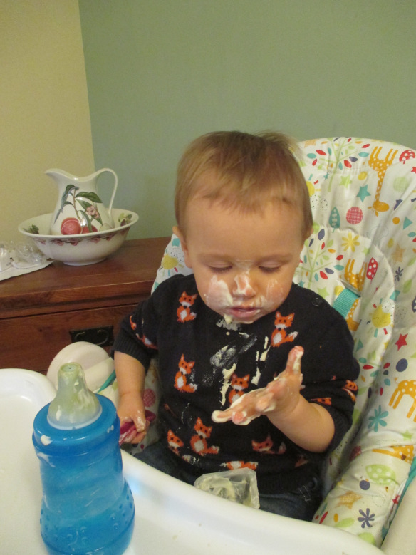 boy with yoghurt on his face