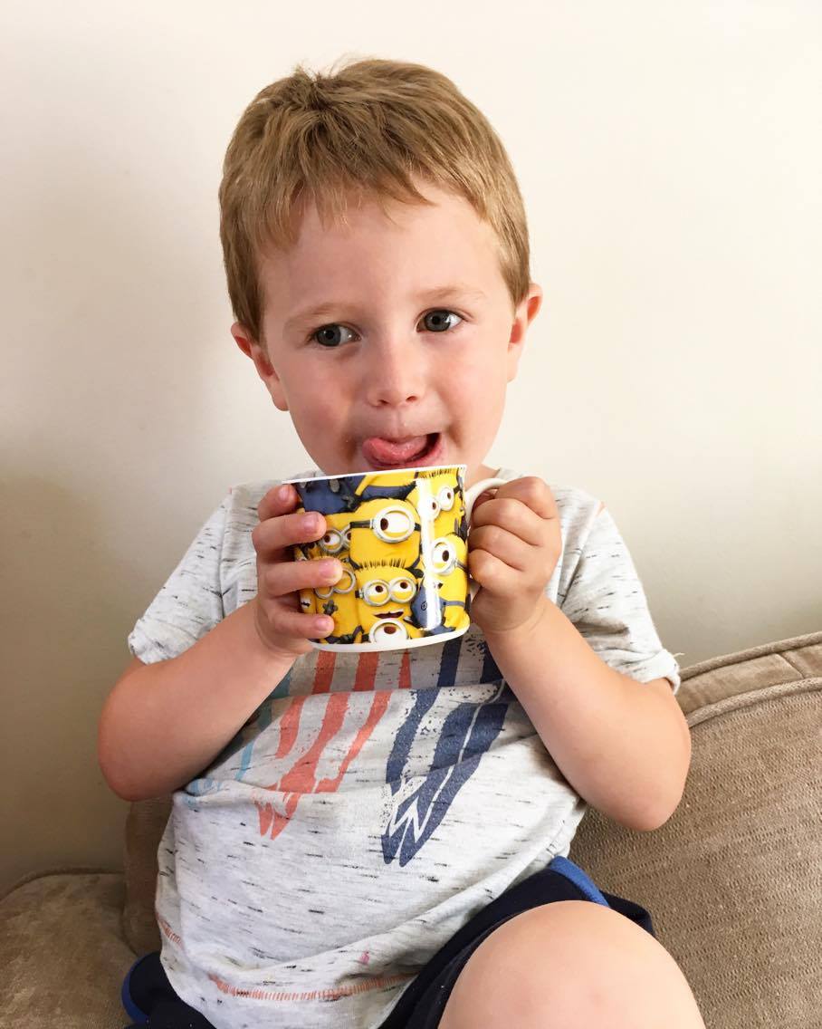 child with despicable me mug