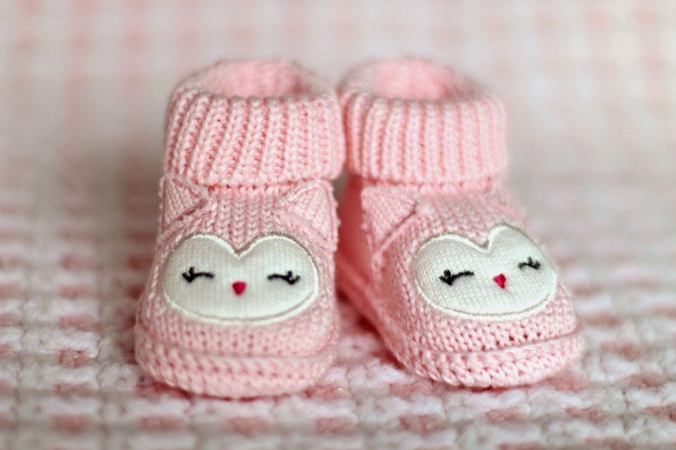 2 baby pink booties