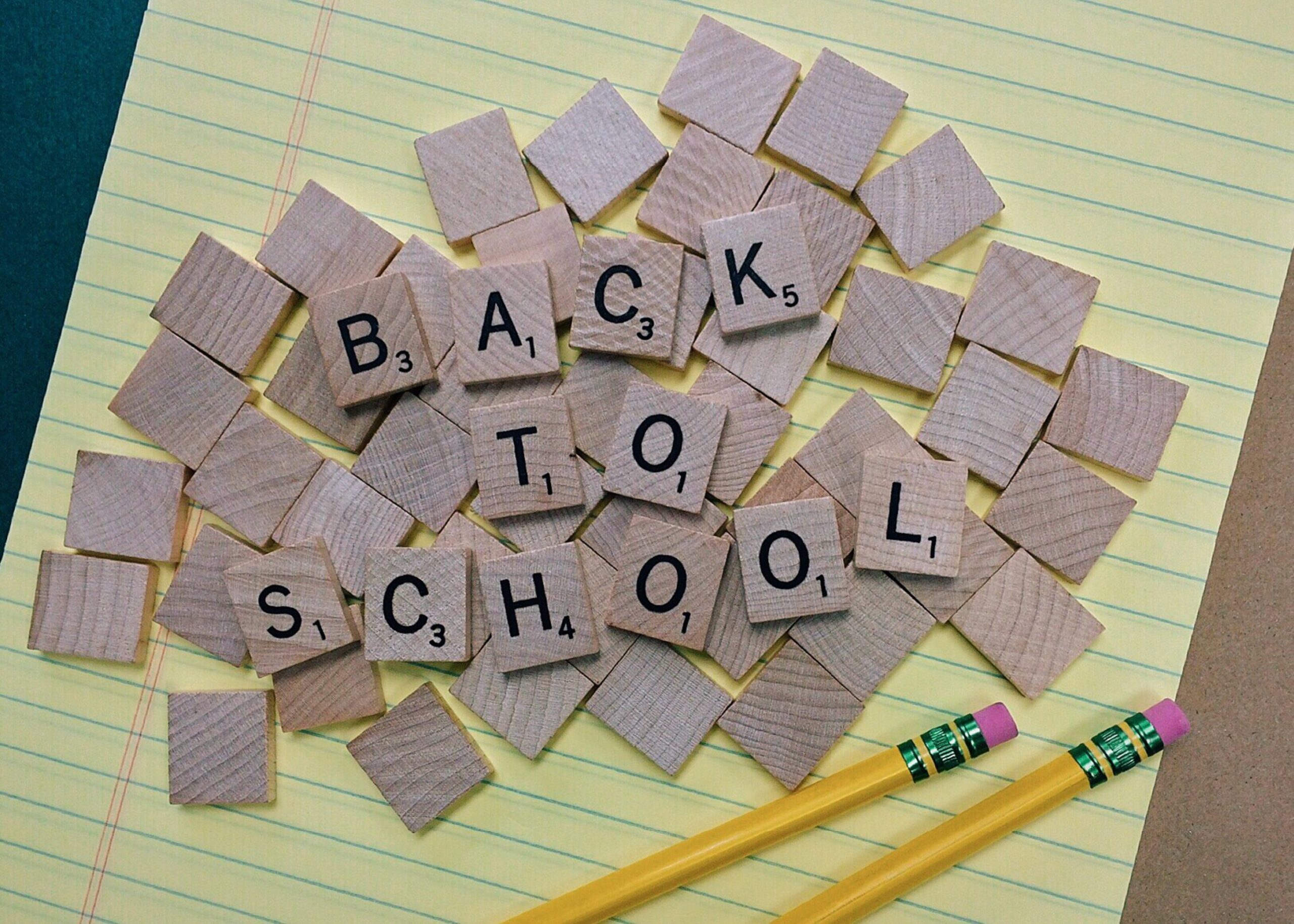 back to school written out on scrabble pieces