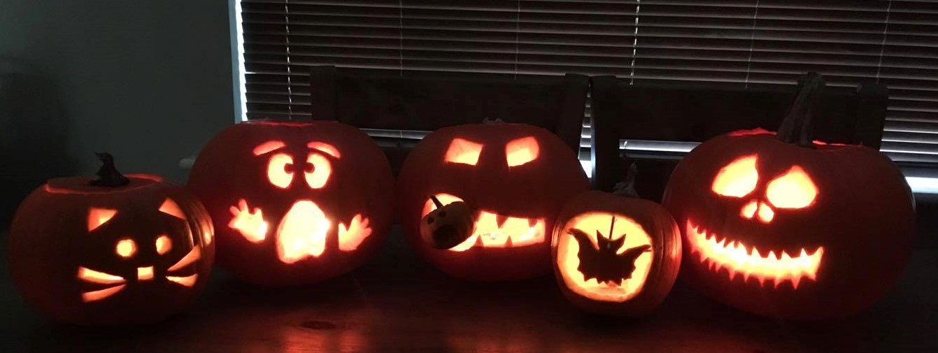 five carved pumpkins