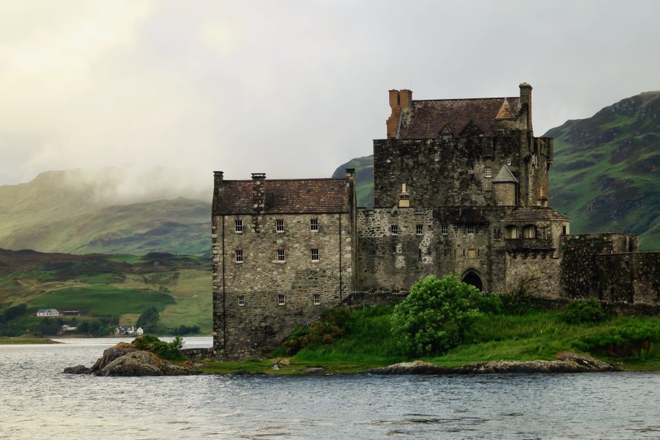 Lake and karge building at John O Groats