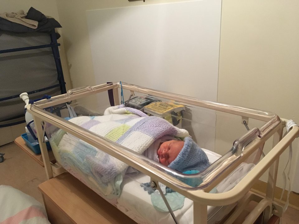 William in his hospital cot