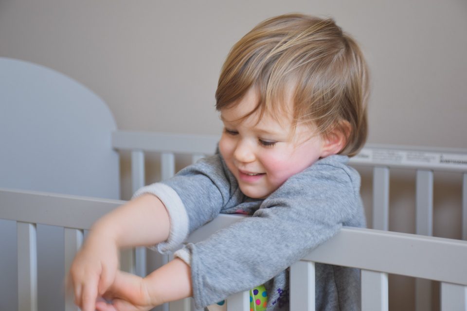 child in a cot