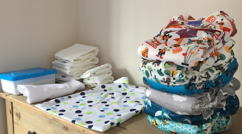 all in one cloth nappies plus wetbag, wipes and boosters