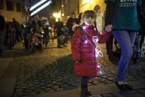 Bliss premature charity little lights walk child with lights on her at night