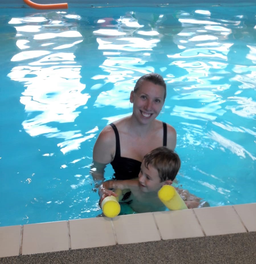 mum and child in a swimming pool