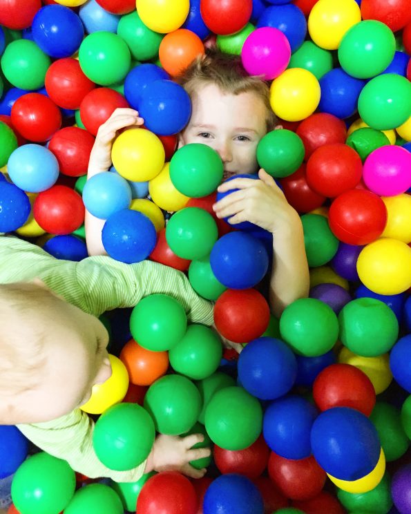 Jake and William in a ball pit