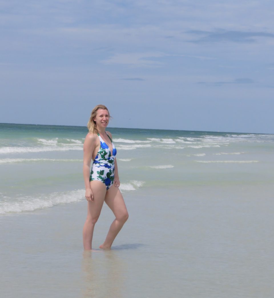 me stood in the sea wearing my swimsuit from UK swimwear