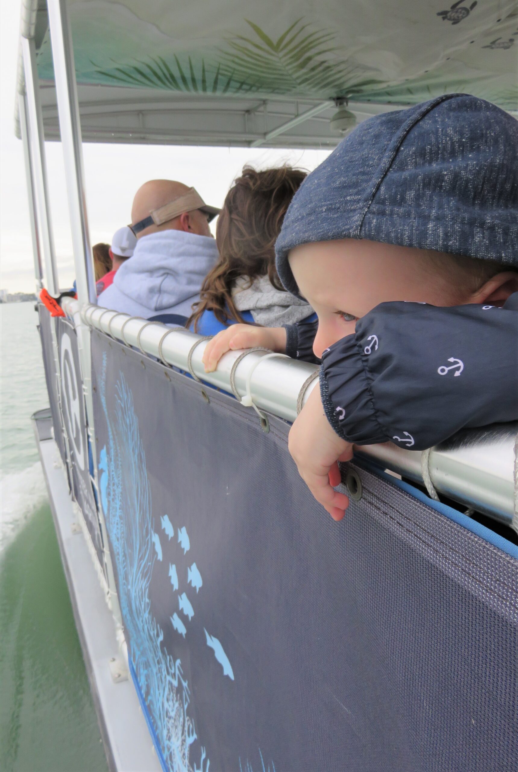 william looking over the side of the boat