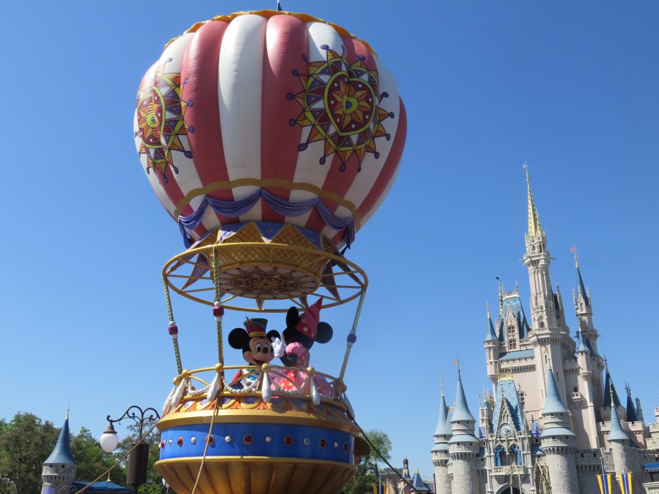 Mickey and Minnie in a hot air balloon in the parade