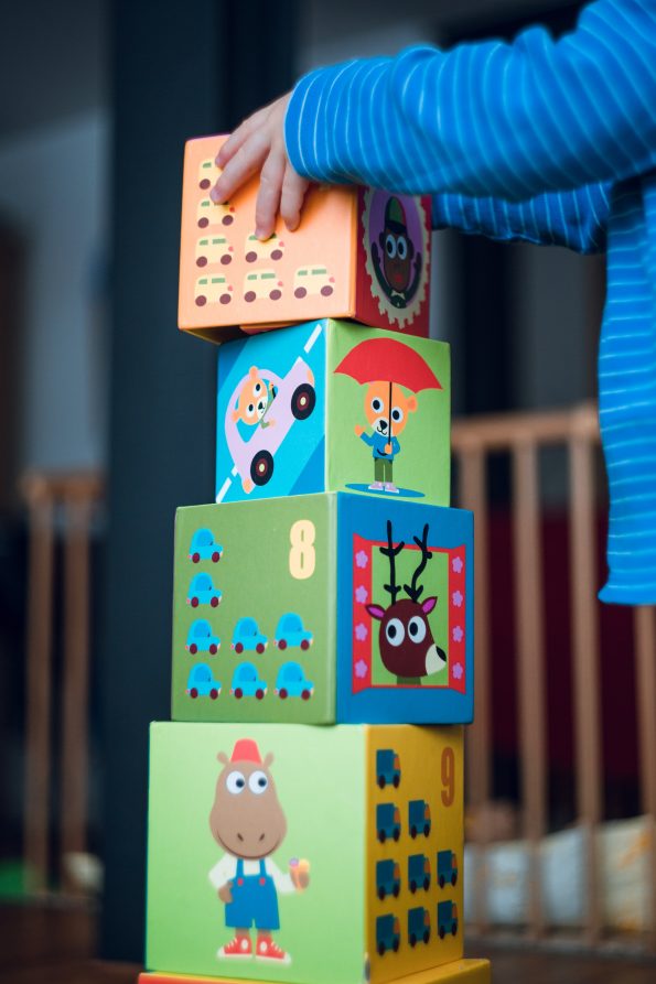 child with building blocks