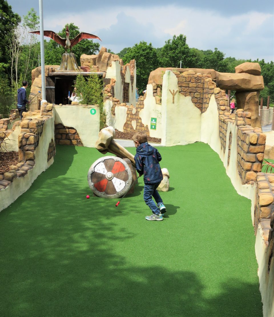 Jake on the part of the course with shields at mighty claws adventure golf