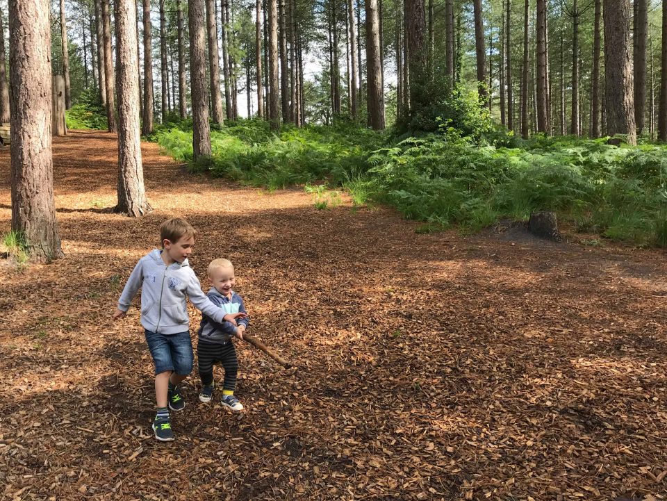 boys with a stick