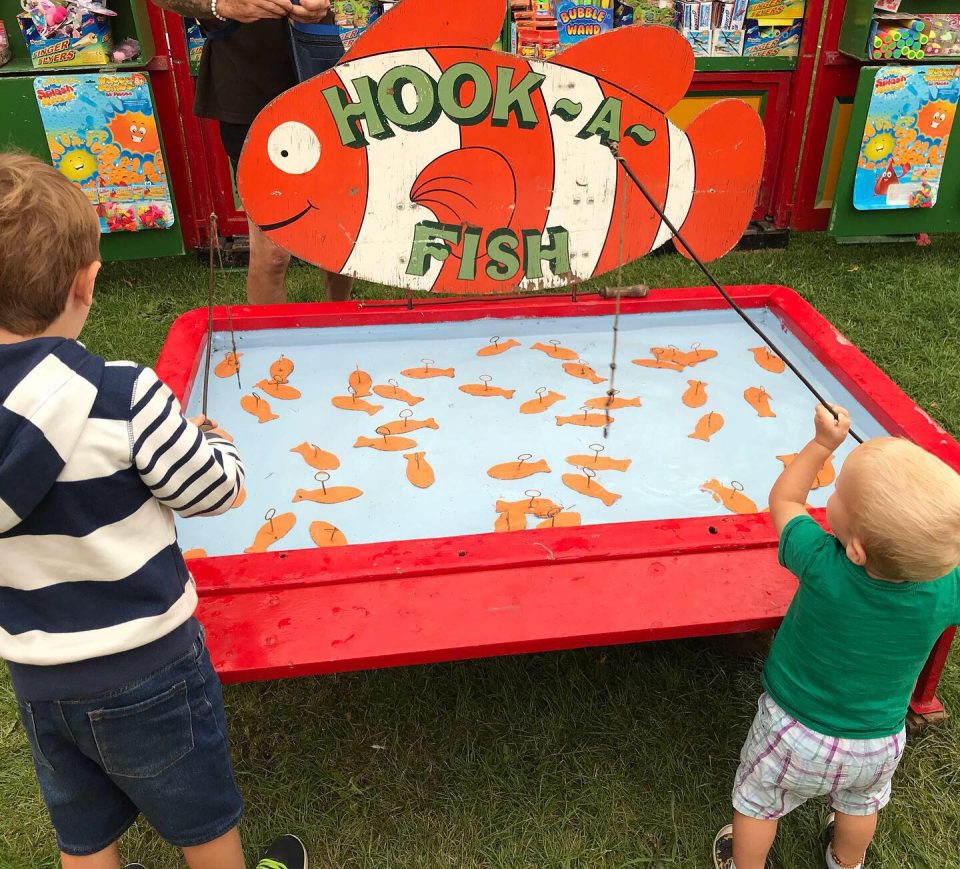 boys doing hook a fish