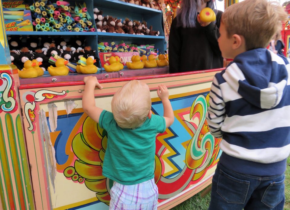 boys doing hook a duck