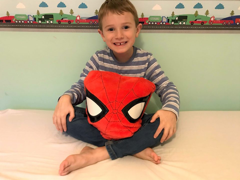 Jake sat with his shopDisney spiderman cushion on his lap