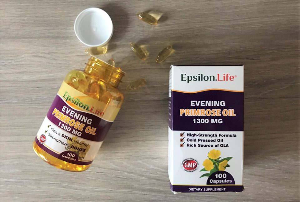 epsilon evening primrose oil tablets scattered on the kitchen top