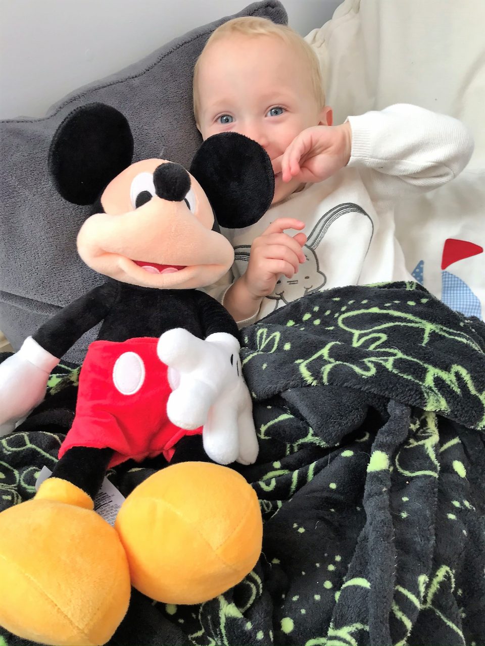 william sat with Mickey Mouse toy