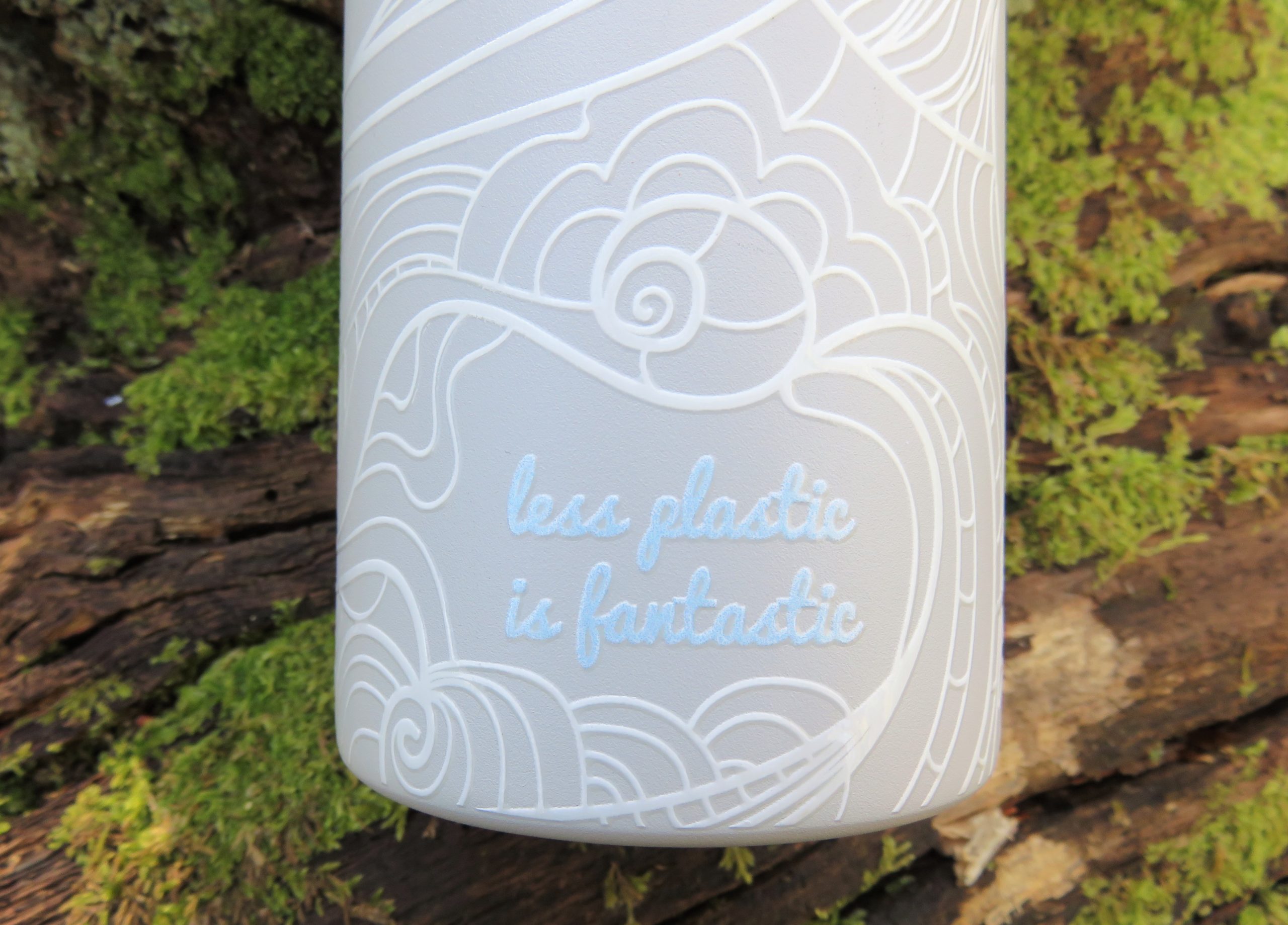 water bottle words which read less plastic is fantastic