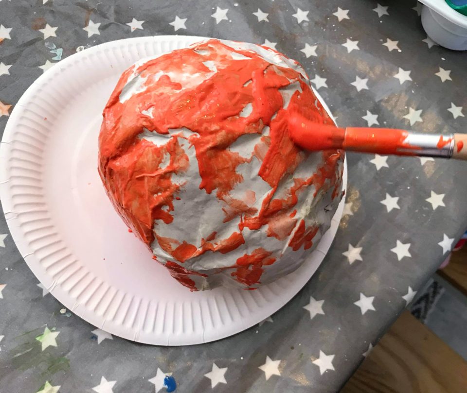 painting our paper mache planet