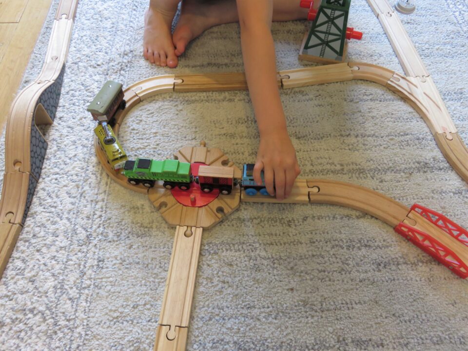 the brio train track being played with 