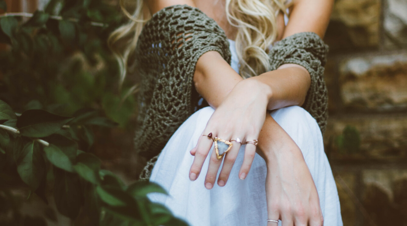 lady sat with jewellery on her hands