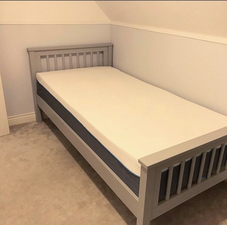 the bed with the mattress on
