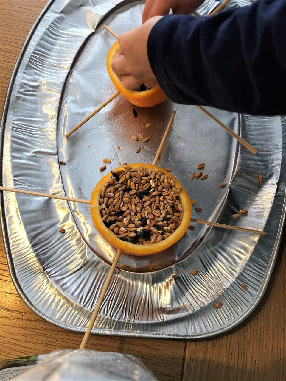 the oranges being filled with the seed