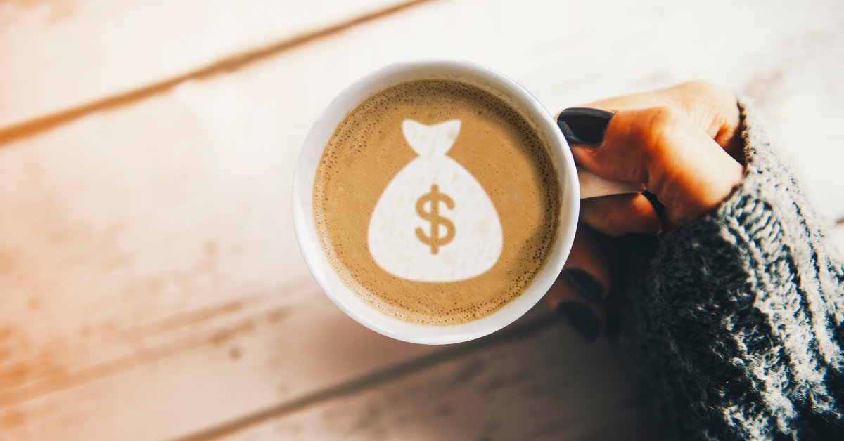 a money bag etched in the top of a coffee cup