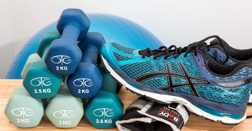 dumbells and trainers