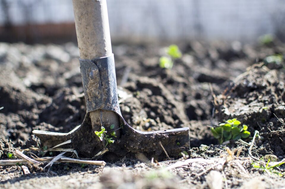a spade in soil
