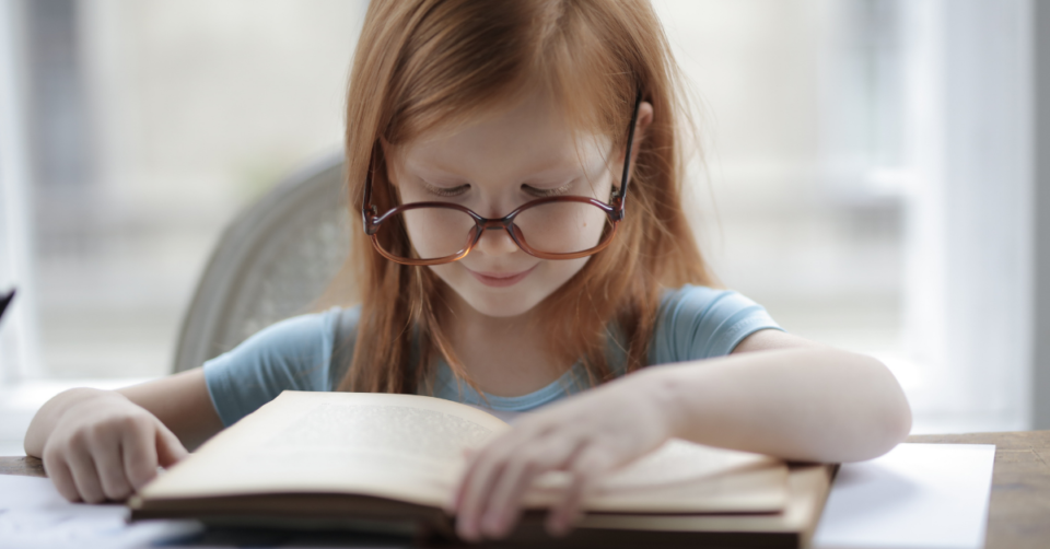 a little girl reading