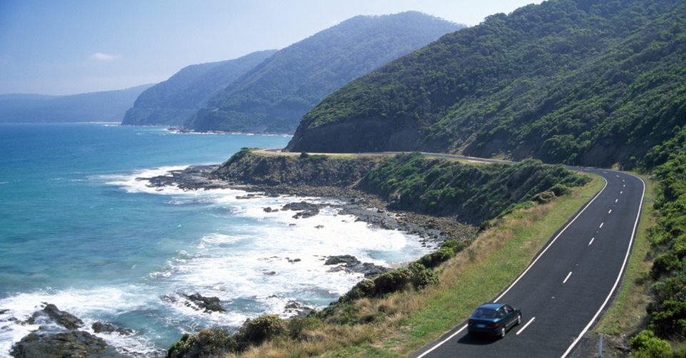 a coastal drive with a car on a road