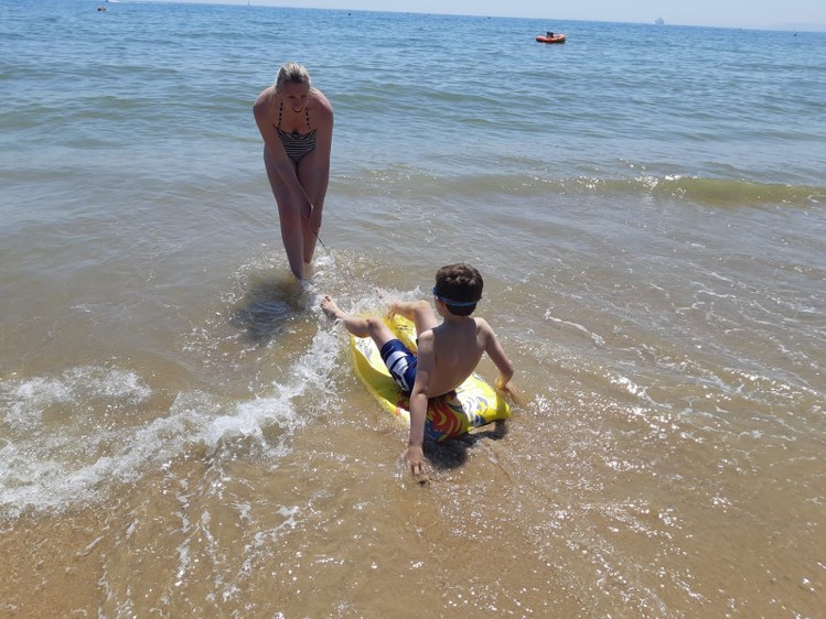 me pulling Jake on his body board