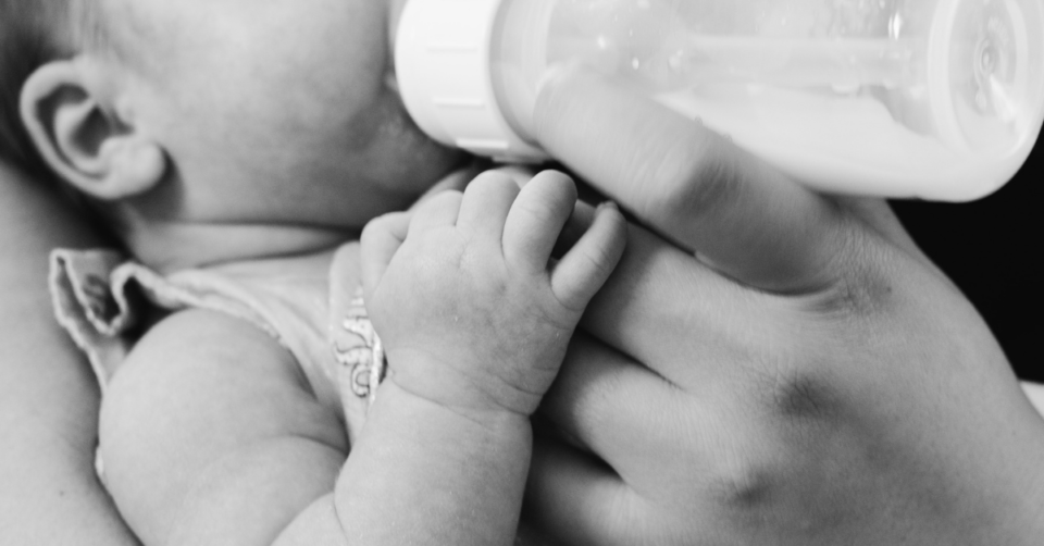 baby being bottle fed