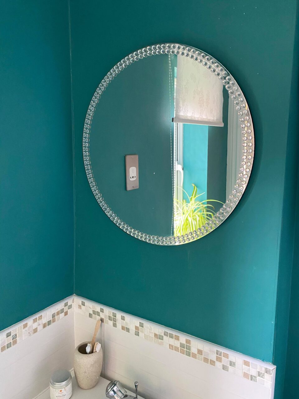 the mirror in our updated bathroom