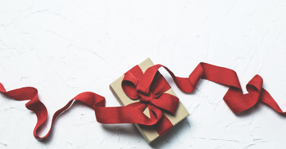 a gift with red ribbon
