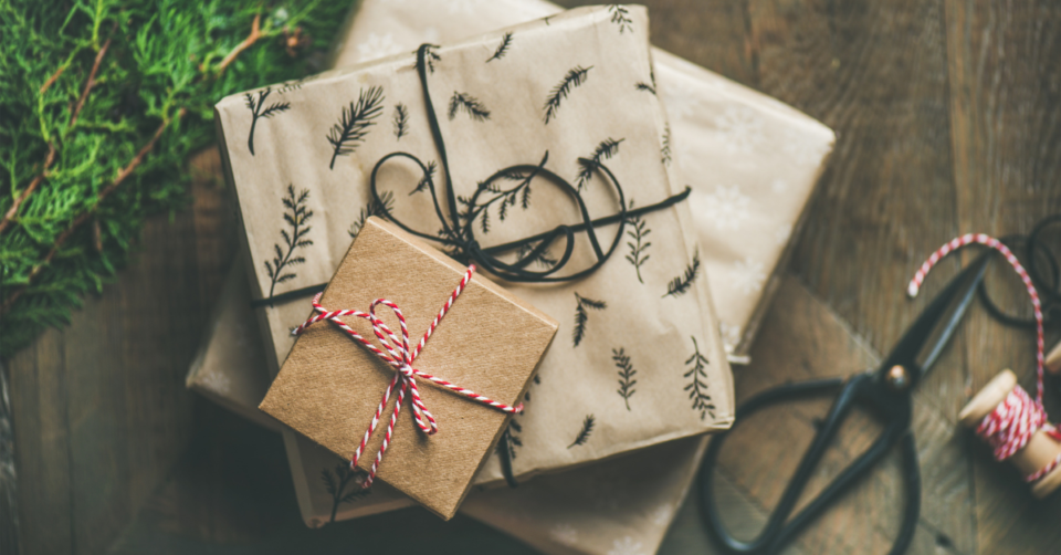 gifts wrapped in brown paper and string