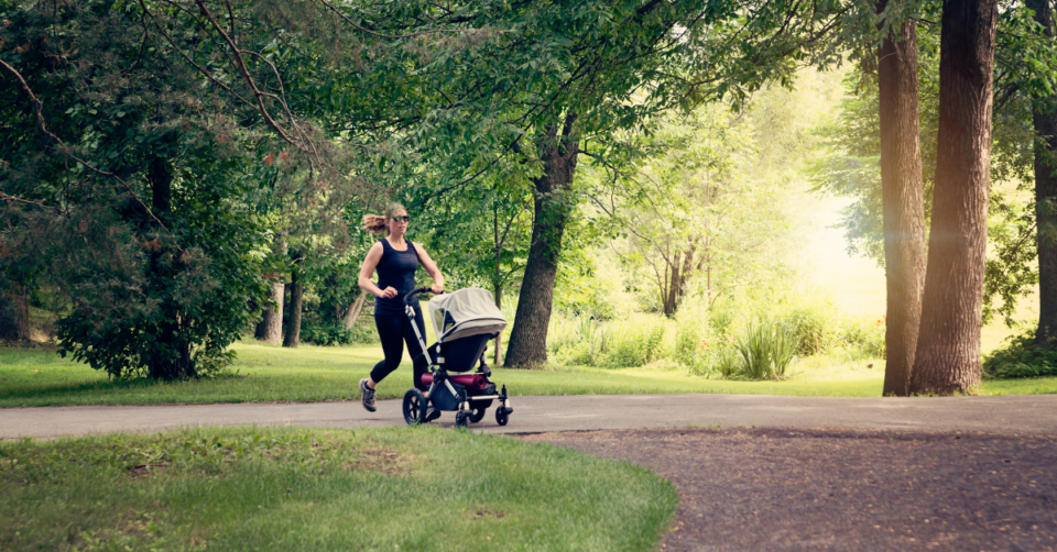a mum jogging with a stroller