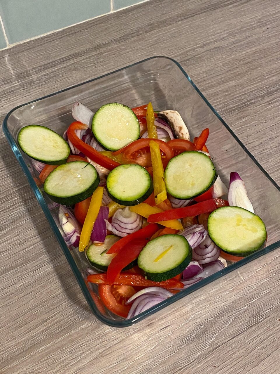 the vegetables chopped and olive oil drizzled over ready to go into the oven