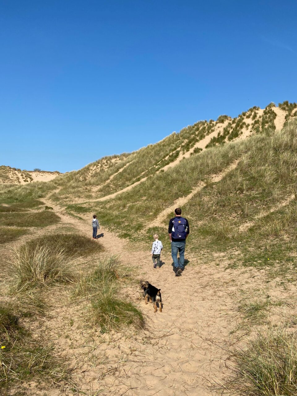 my family walking acrioss the nature reserve