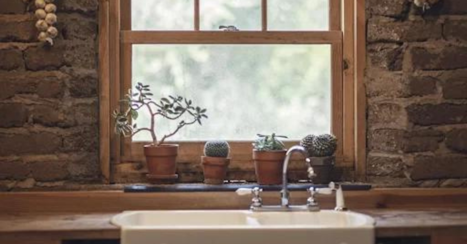 sink with terracotta pots and sustainable home look