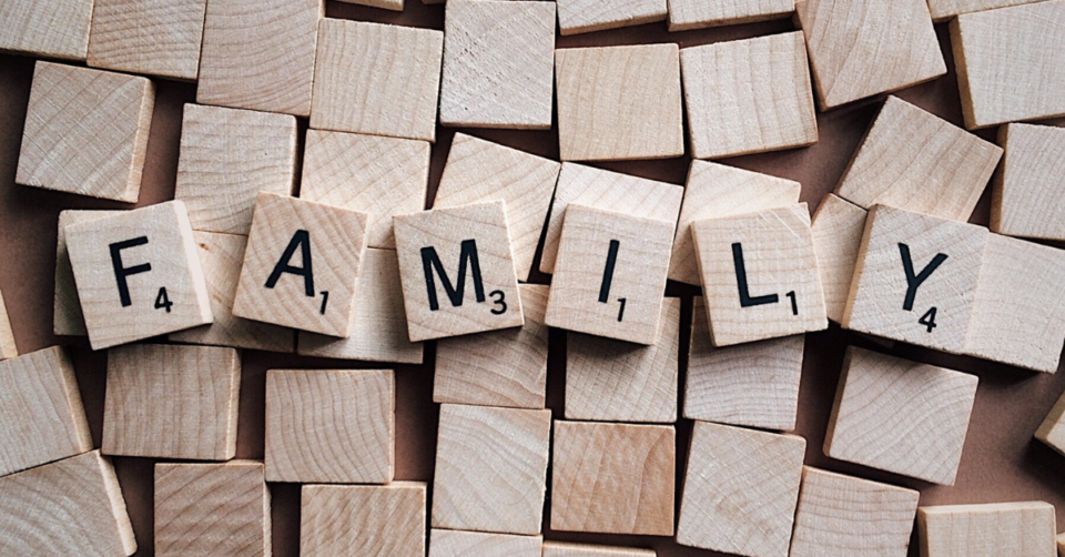 scrabble letters spelling out family